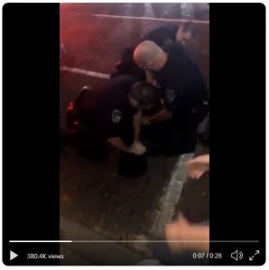 A screenshot of a video posted on social media by @amourkaja appears to show the arrest of Ty Patrick Bealer early Sunday on Court Street. Athens Police Chief Tom Pyle called the officers actions "reasonable and restrained."