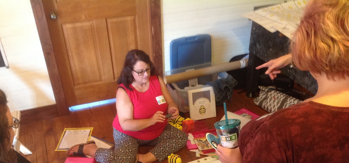 Learning Lab Early Childhood Specialist Jaclyn Casey conducts a Bee-Bot demonstration for area educators