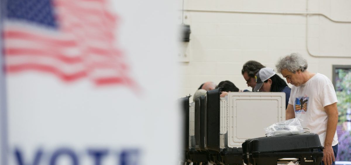 Voters cast their ballots at a polling station set up at Grady High School for the mid-term elections last November in Atlanta, Georgia. Georgia is set to replace all of its voting machines, which cybersecurity experts had deemed insecure, before the 2020 elections.