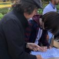 HB6 Referendum petitioner collects signatures on Otterbein University's campus.