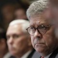 Attorney General William Barr, center, and Vice President Mike Pence, left