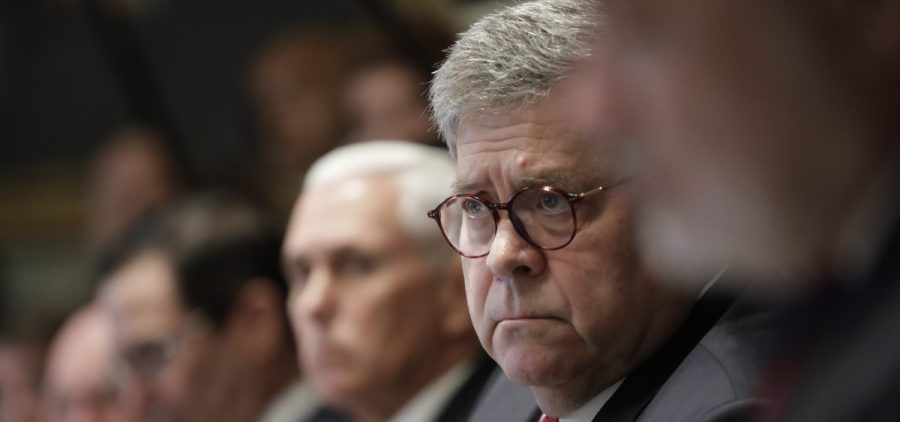 Attorney General William Barr, center, and Vice President Mike Pence, left