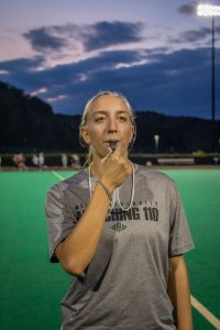 Sophia Medvid, Marching 110's first female field commander, poses for a picture after a evening practice on Wednesday October, 9 2019 in Athens, Ohio (Sarah Ellen James/WOUB).