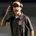 Nelsonville-York head coach Rusty Richards yells to his players during the game against River Valley on Sept. 20, 2019.