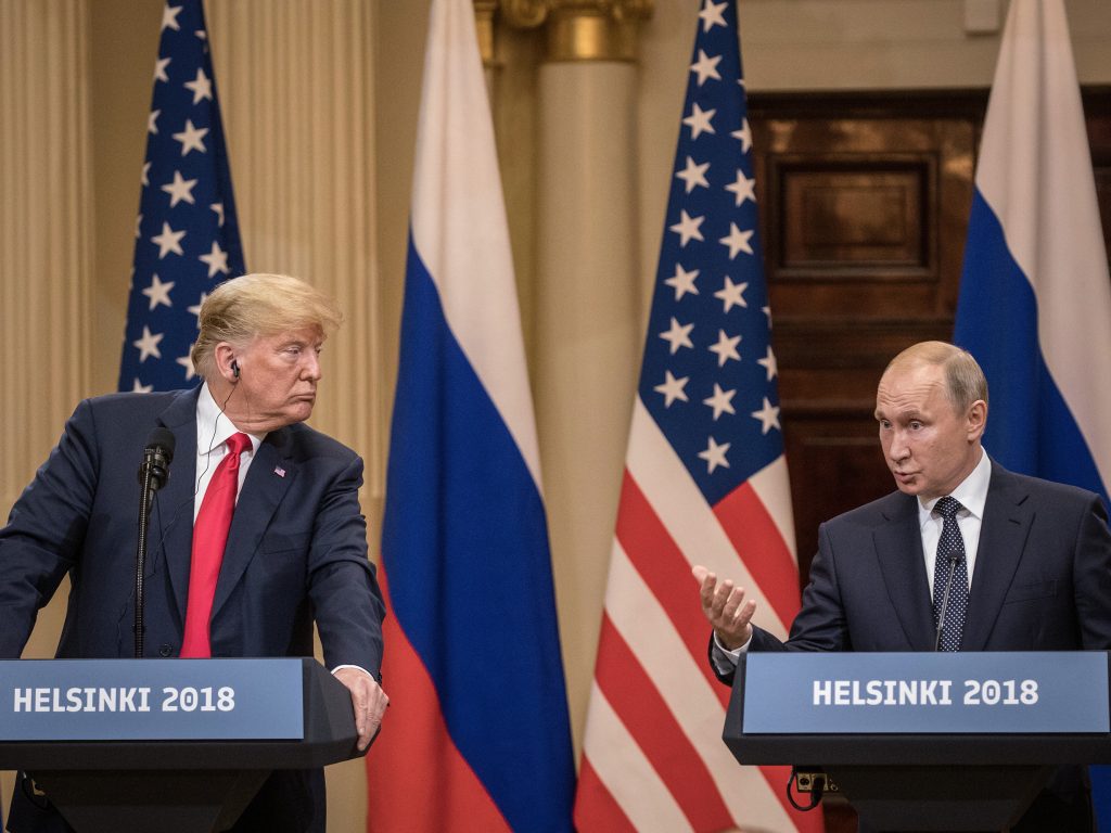 President Trump and Russian President Vladimir Putin answer questions about 2016 U.S. election interference during a joint news conference after their summit on July 16, 2018, in Helsinki.