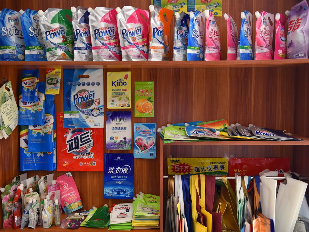 The Dongguan Fangjie Printing and Packaging Company produces brightly colored plastic bags, including bags for detergent, candy and dog poop.