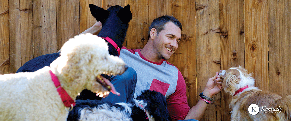 Brandon McMillan with some dogs