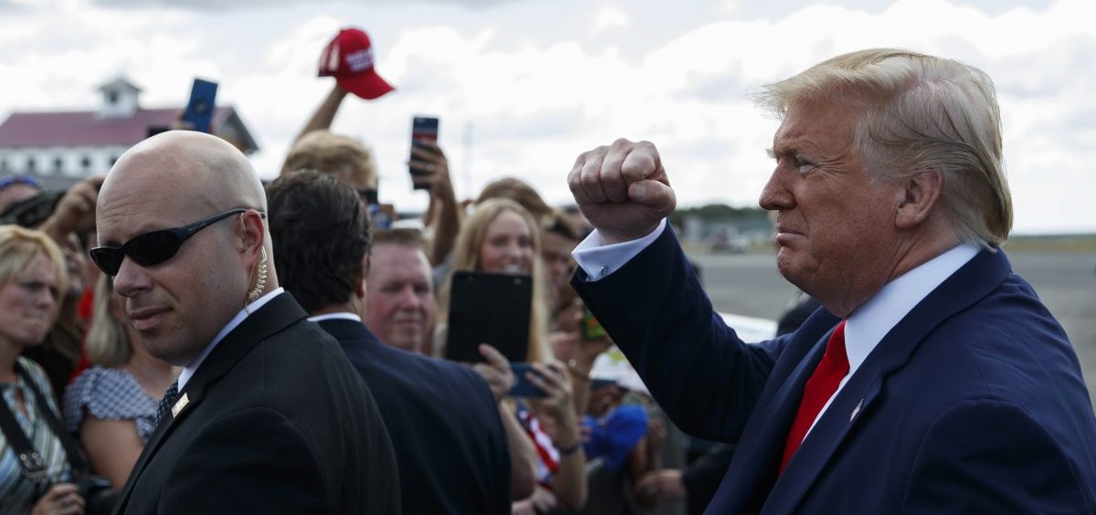 President Donald Trump greets supporters after arriving at Ocala International Airport, Thursday, Oct. 3, 2019, to give a speech on health care at retirement community, The Villages.