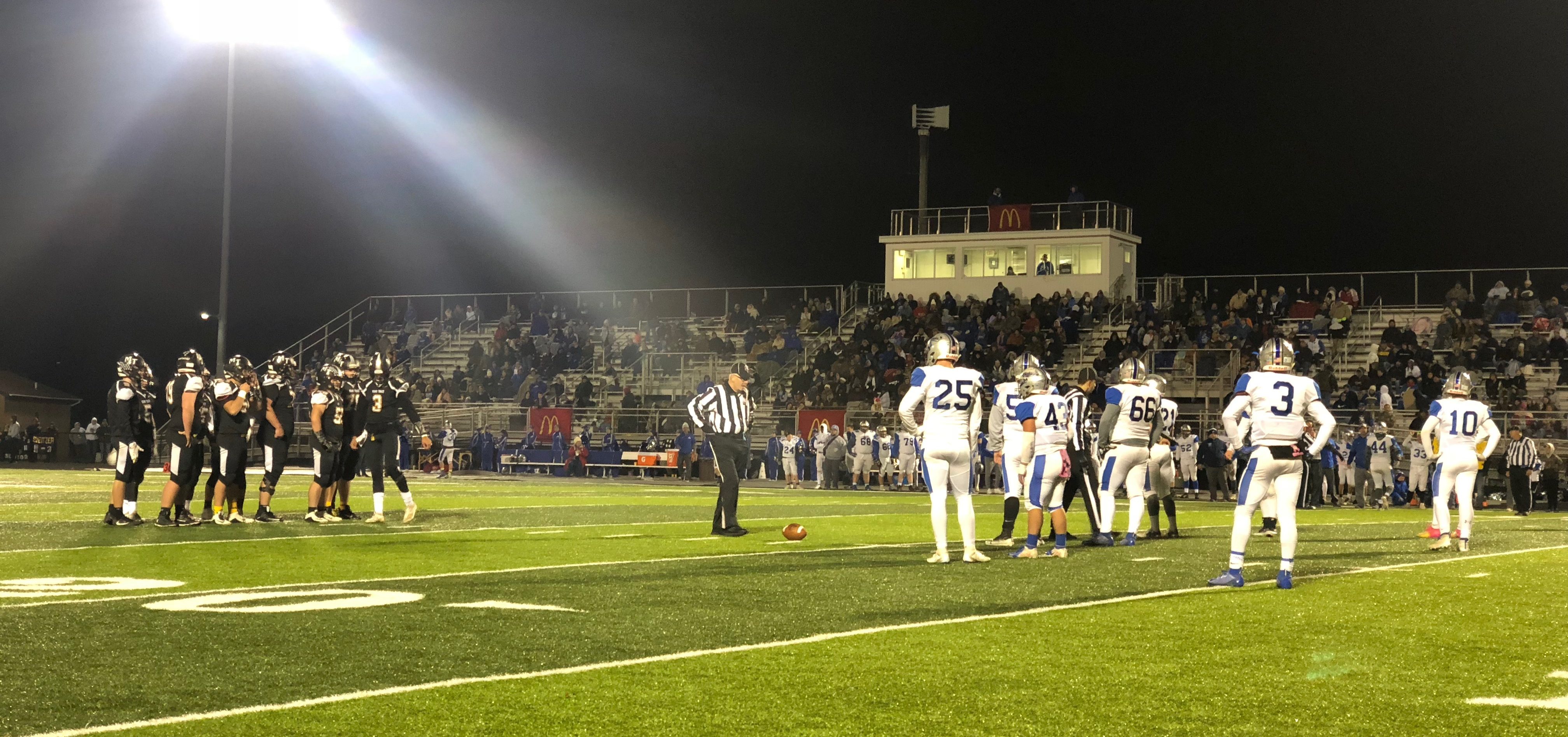 The Washington Court House Blue Lions and the Miami Trace Panthers huddle up before a play on a game during week 10 on November 1, 2019.