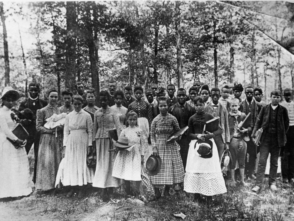 Students attending Berea College in 1887. Berea was the first interracial and coeducational college in the South.