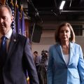 Speaker of the House Nancy Pelosi, D-Calif., and Rep. Adam Schiff, D-Calif., depart a press conference at the Capitol on Oct. 2. The impeachment inquiry enters a new phase this week with the start of public hearings.