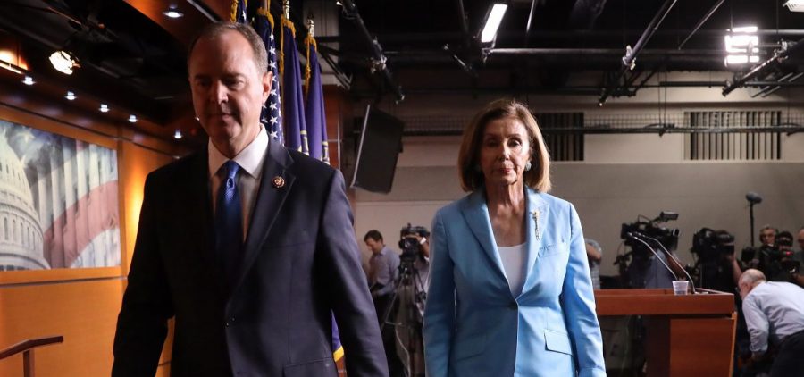 Speaker of the House Nancy Pelosi, D-Calif., and Rep. Adam Schiff, D-Calif., depart a press conference at the Capitol on Oct. 2. The impeachment inquiry enters a new phase this week with the start of public hearings.