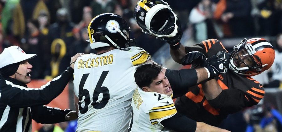 Cleveland Browns defensive end Myles Garrett hits Pittsburgh Steelers quarterback Mason Rudolph with his own helmet as offensive guard David DeCastro tries to intervene, in the final seconds of their game Thursday night.