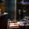 Infants exposed to opioids in utero often experience symptoms of withdrawal. An infant is being monitored for opioid withdrawal inside a neonatal intensive care unit at the CAMC Women and Children's Hospital in June 2019, in Charleston, W.Va.
