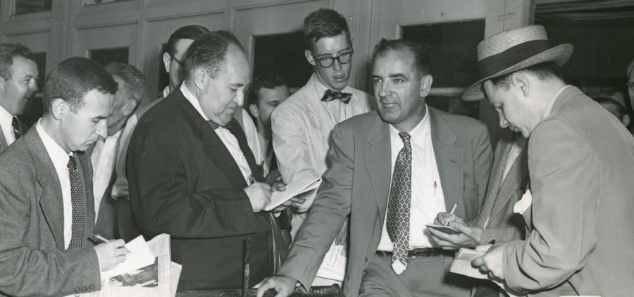 Senator Joseph McCarthy speaking with reporters at LaGuardia Airport shortly after his victory over Len Schmitt in the 1952 Wisconsin Republican primary.