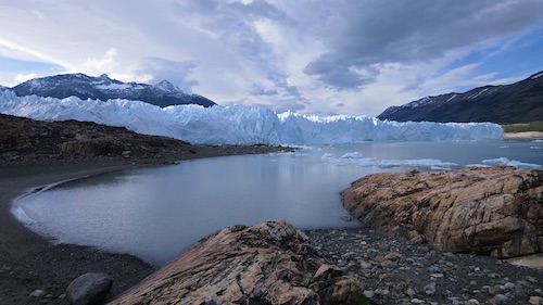 glacier at rocks and lake