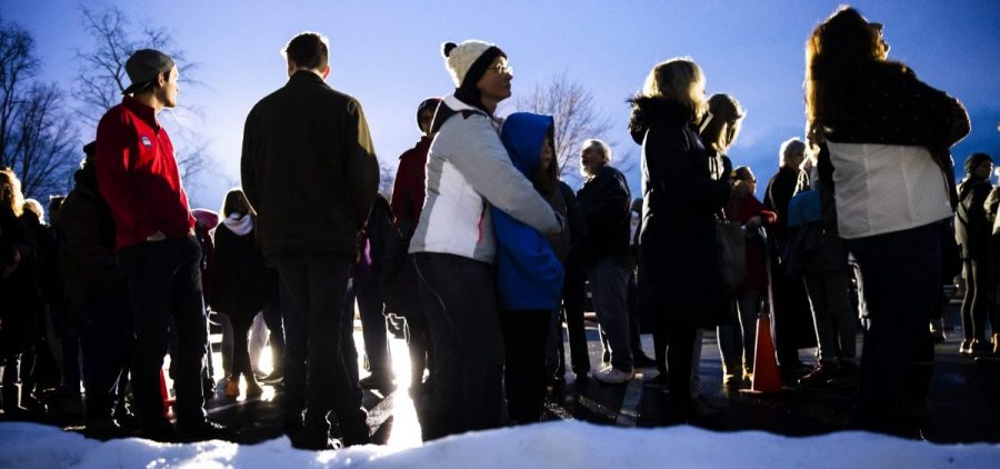 People in Milford, N.H., wait in line to enter an event for Democratic presidential candidate former South Bend, Ind., Mayor Pete Buttigieg on Monday.