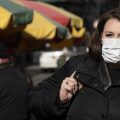 A woman, who declined to give her name, wears a mask in New York out of concern for the newly emerged coronavirus.