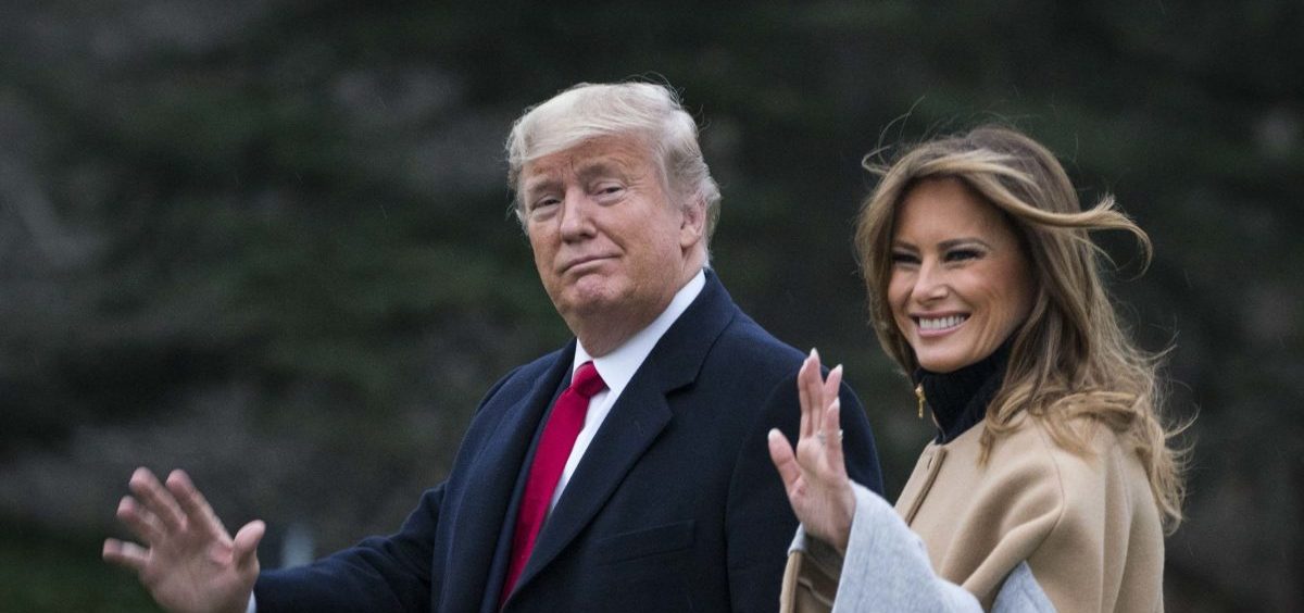 President Trump and first lady Melania Trump walk along the South Lawn as they depart from the White House for a weekend trip to Mar-a-Lago in Florida on Friday.