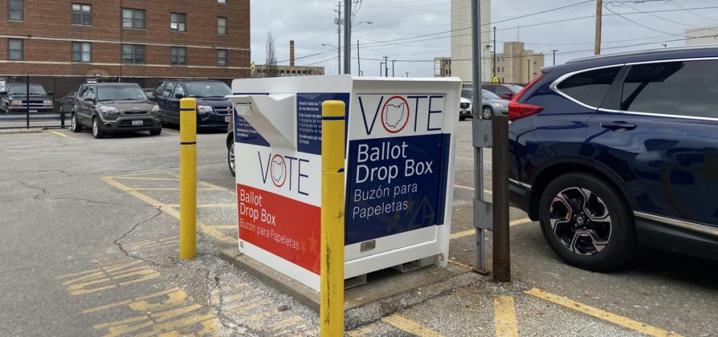A box to drop off absentee ballots sits in the parking lot of the Cuyahoga County Board of Elections in Cleveland.