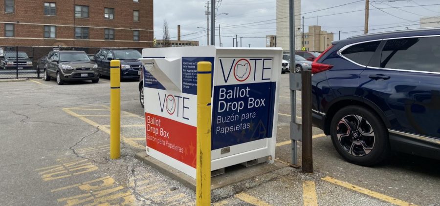 A box to drop off absentee ballots sits in the parking lot of the Cuyahoga County Board of Elections in Cleveland.