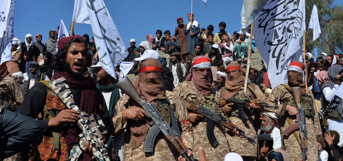Militants linked with the Afghan Taliban gather Monday for a ceremony in Laghman province, celebrating the agreement the group signed with the U.S. over the weekend. Since the deal was announced, the Taliban has resumed its attacks in Afghanistan.