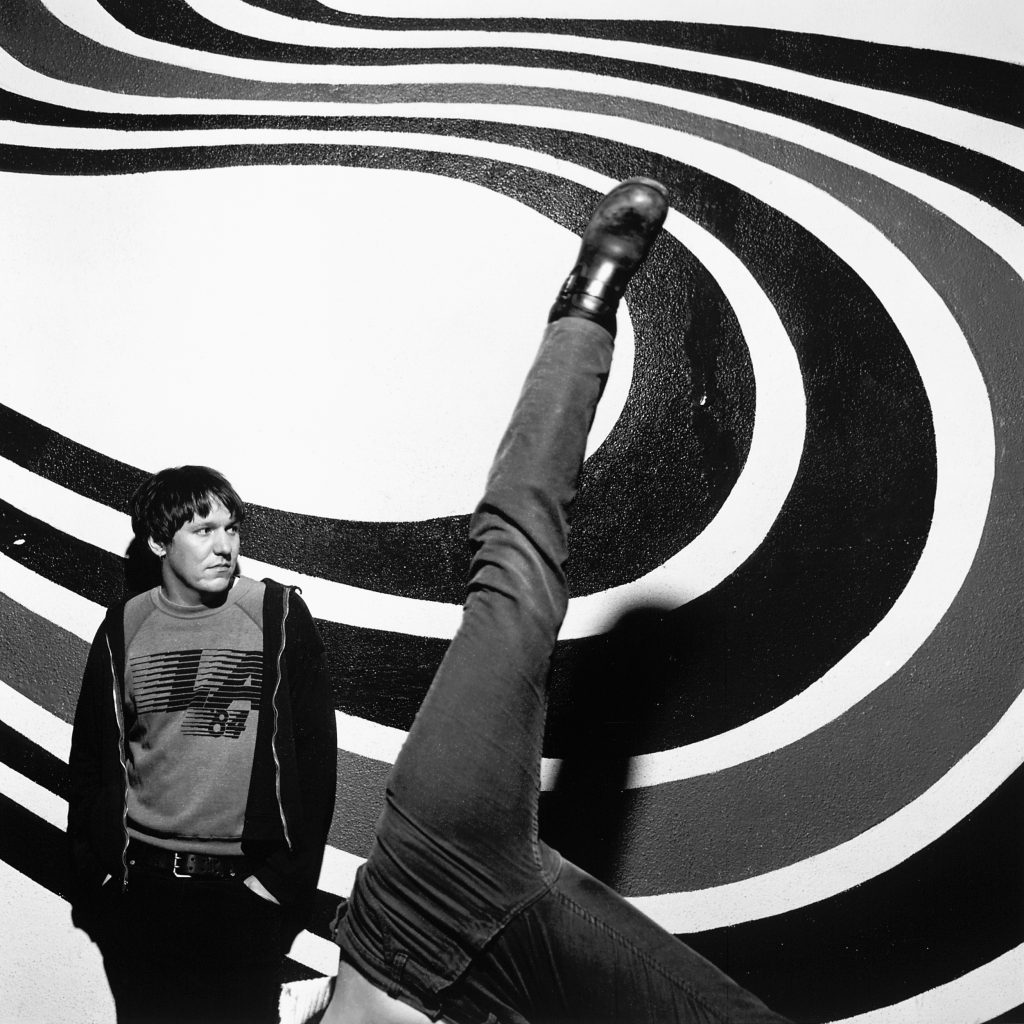 Elliott Smith photographed by Autumn de Wilde, in an image from the Figure 8 cover shoot.