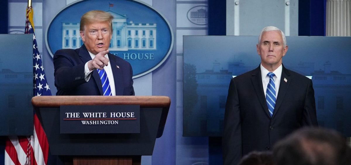 President Trump, flanked by Vice President Mike Pence, speaks during the daily briefing on the novel coronavirus at the White House Thursday.