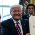 President Trump signs the Paycheck Protection Program and Health Care Enhancement Act last week. The law added billions for loans for small businesses through the PPP.