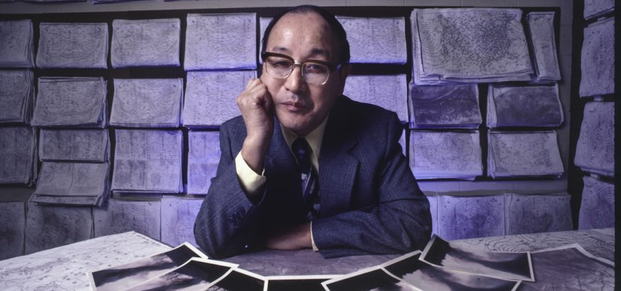 professor Fujita in lab with documents
