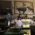 Cory Obenour, chef and co-owner of the Blue Plate restaurant in San Francisco, prepares takeout and delivery orders. The restaurant received funds from the Paycheck Protection Program, according to the Associated Press.