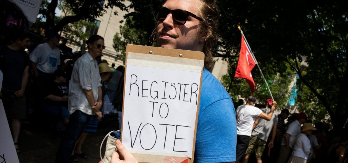 A voter registration volunteer in Philadelphia in 2018. New registrations had surged going into 2020 but have dropped off dramatically as a result of the coronavirus pandemic.