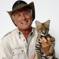 Wildlife advocate Jack Hanna poses for a portrait with a serval cub on Monday, Oct. 12, 2015 in New York