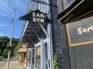 A sign for Sam's Gym on High Street in Glouster, Ohio. 