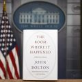 A copy of John Bolton's new book, The Room Where It Happened, stands in the White House briefing room. On Saturday, a federal judge declined the Trump administration's request to block the publication of the former national security adviser's book.