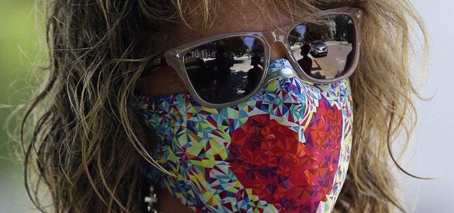 The Department of Justice has issued an alert about a card circulating online falsely claiming that holders are legally exempt from wearing a mask. Public health officials overwhelmingly recommend wearing a mask when going out in public.
