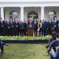 Surrounded by some of the members of the White House Coronavirus Task Force, President Donald Trump speaks at a press conference on COVID-19 in the Rose Garden of the White House on March 13. Of the 27 task force members, two are women, standing to Trump's left: Dr. Deborah Birx and Seema Verna (holding the sheath of papers).