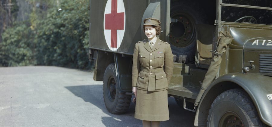 April 1945: Princess Elizabeth, a 2nd Subaltern in the ATS standing in front of an ambulance.