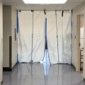 A hallway leads to a makeshift isolation ward for COVID-19 patients.