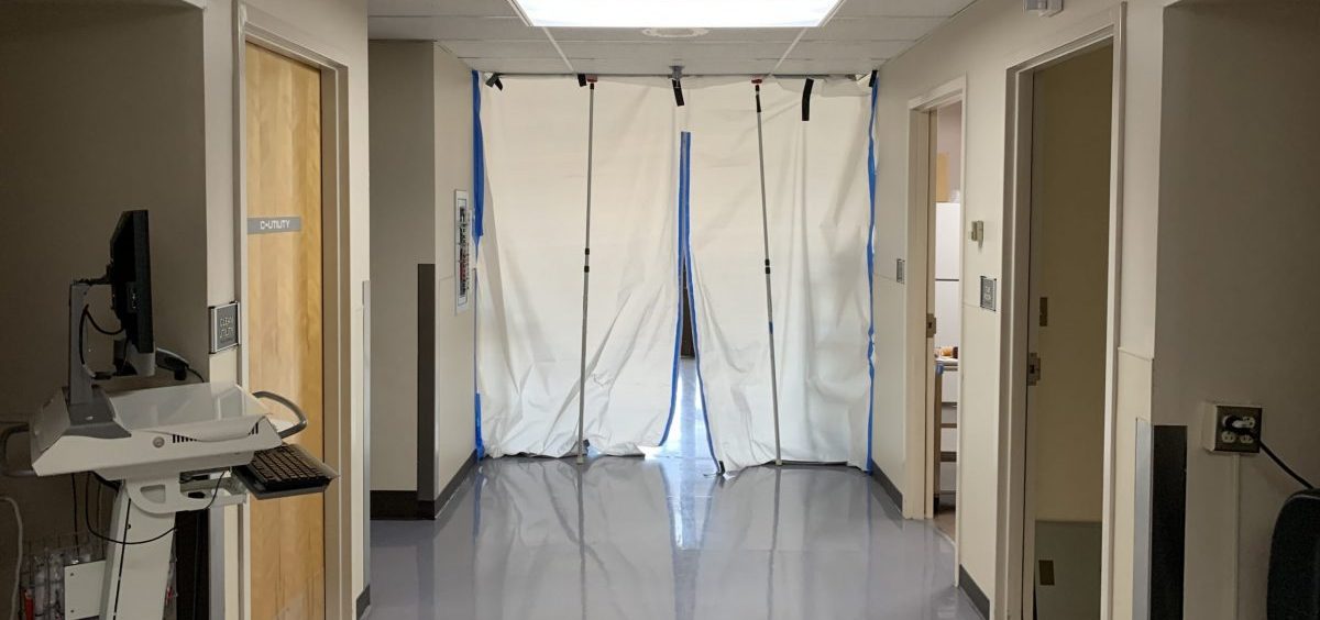 A hallway leads to a makeshift isolation ward for COVID-19 patients.