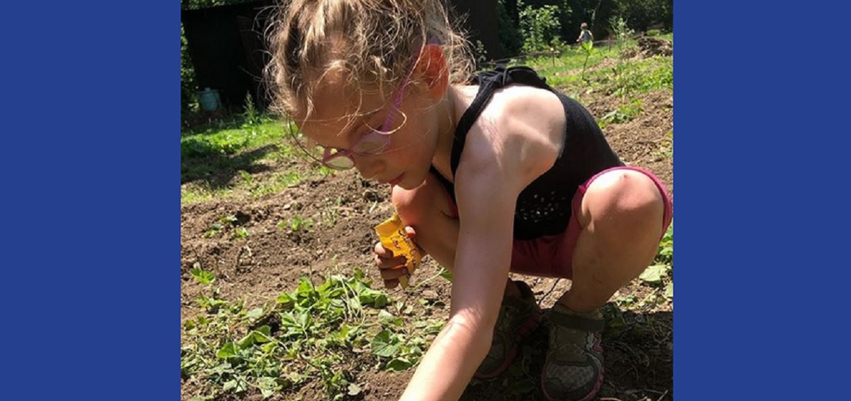 Osborn daughter planting a garden