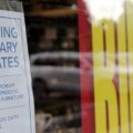 A sign advertises hiring of temporary workers at a Pier 1 store that's going out of business in Coral Gables, Fla. Last week, initial unemployment claims broke a 20-week streak of being above 1 million.