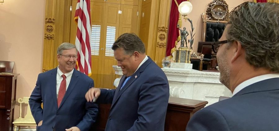 Speaker Bob Cupp (R-Lima, left) laughs with Rep. Jon Cross (R-Kenton) after session on July 30, as Rep. Todd Smith (R-Farmersville) looks on. Cross is among the Republicans who have proposed bills to push back on Gov. Mike DeWine's public health orders.