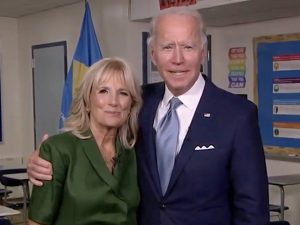 Democratic presidential nominee Joe Biden joins his wife Jill Biden in a classroom after her address to the virtual Democratic National Convention on Tuesday.