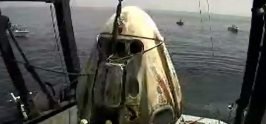 The SpaceX capsule sits aboard a recovery ship in the Gulf of Mexico.
