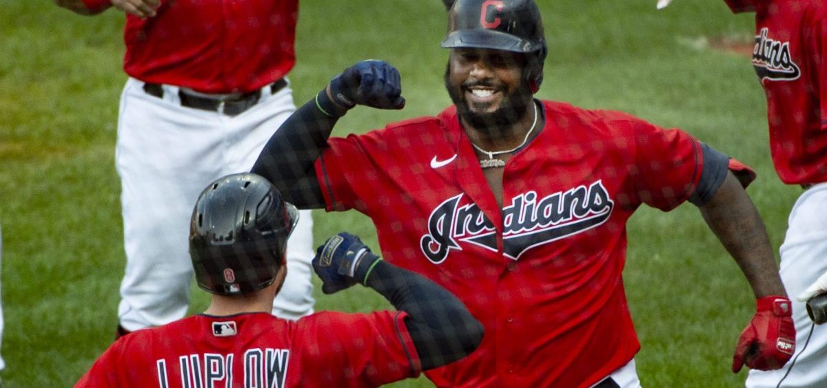 Cleveland Indians' Franmil Reyes celebrates with Cleveland Indians' Jordan Luplow (8) after hitting a three-run home run off Pittsburgh Pirates relief pitcher Geoff Hartlieb during the sixth inning of a baseball game in Cleveland, Sunday, Sept. 27, 2020. The Indians won the game 8-6.