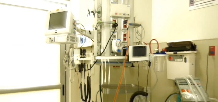 Ventilators and breathing equipment in a room.