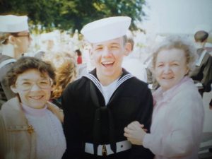 Neben posing with family in Navy uniform