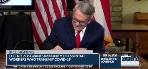 Gov. Mike DeWine signs House Bill 606 in a virtual signing ceremony from his home in Cedarville. Lt. Gov. Jon Husted was in his Columbus office, and Speaker Bob Cupp (R-Lima) and Senate President Larry Obhof (R-Medina) joined from their homes.