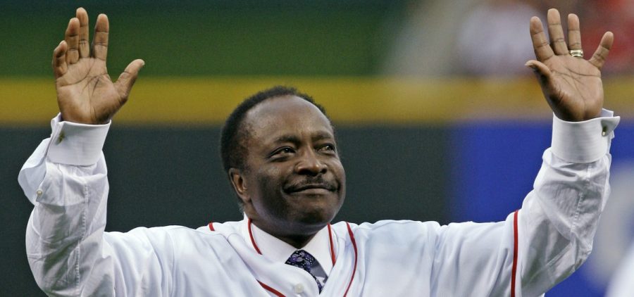 In this Wednesday, April 7, 2010, file photo, Cincinnati Reds Hall of Fame second baseman Joe Morgan acknowledges the crowd after throwing out a ceremonial first pitch prior to the Reds' baseball game against the St. Louis Cardinals, in Cincinnati.